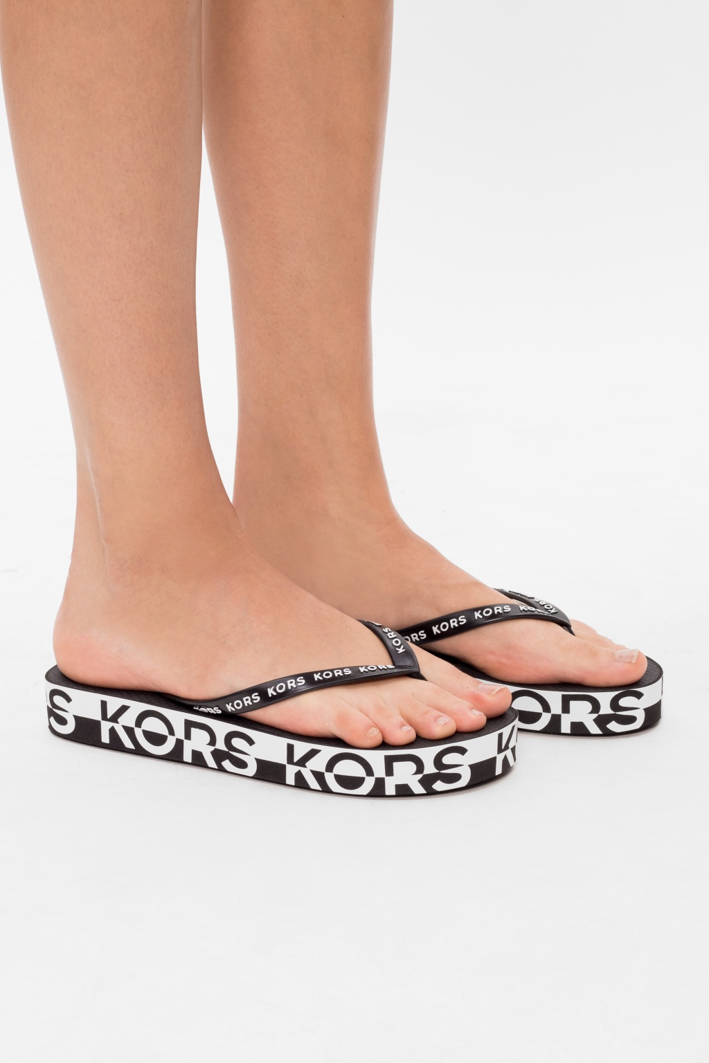 Kors on sale flip flops